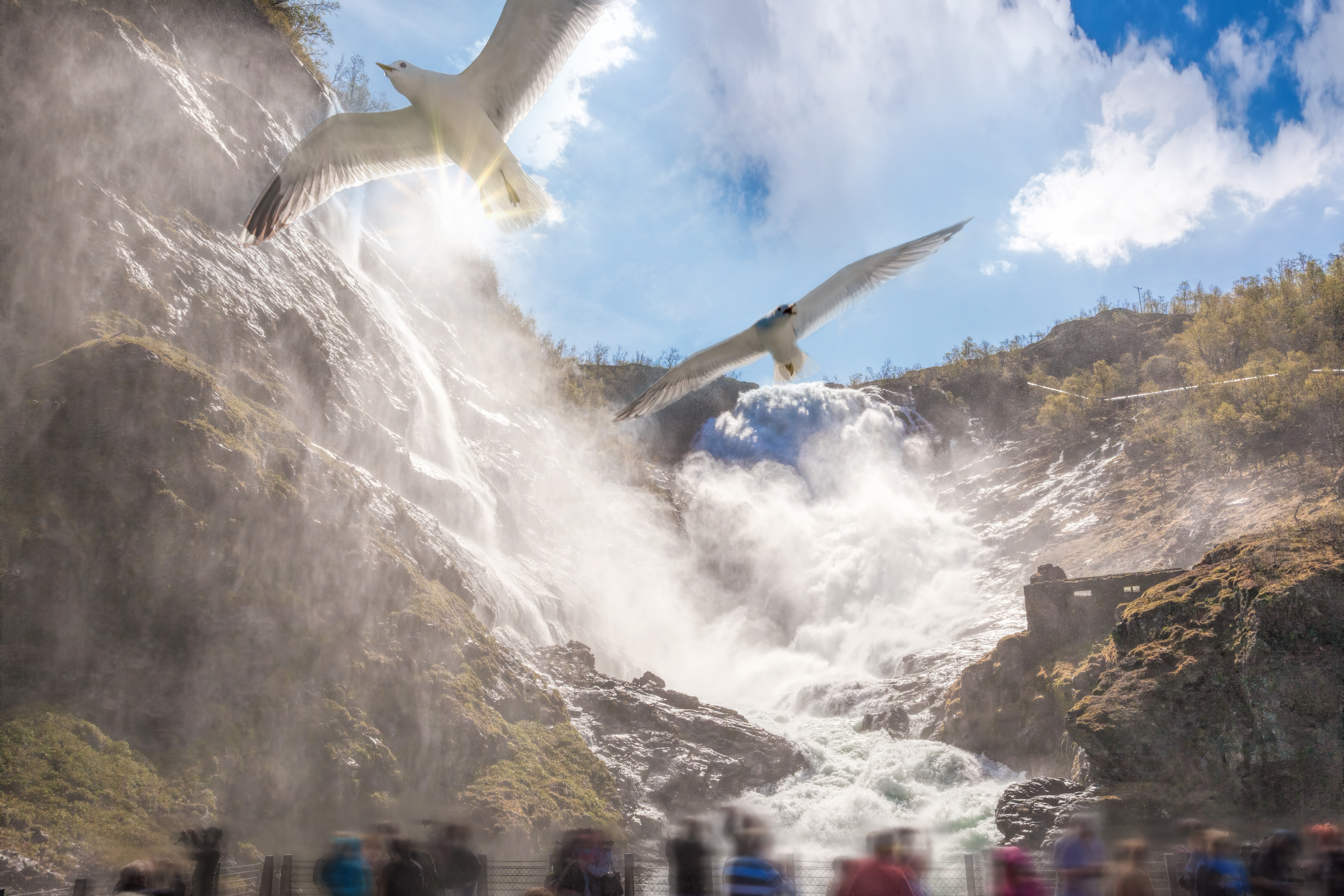 Kjosfossen waterfall viewed from the Flåm Railway train window. The lower 90 meters of free fall are visible from the platform stop.